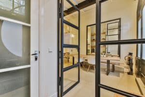 an opened iron door to a room