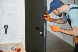expert installing iron doors