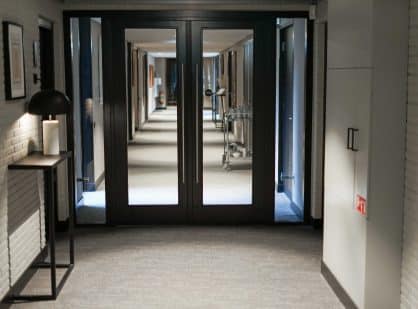 empty hallway with iron door