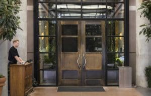 receptionist on front desk looking for the front iron door